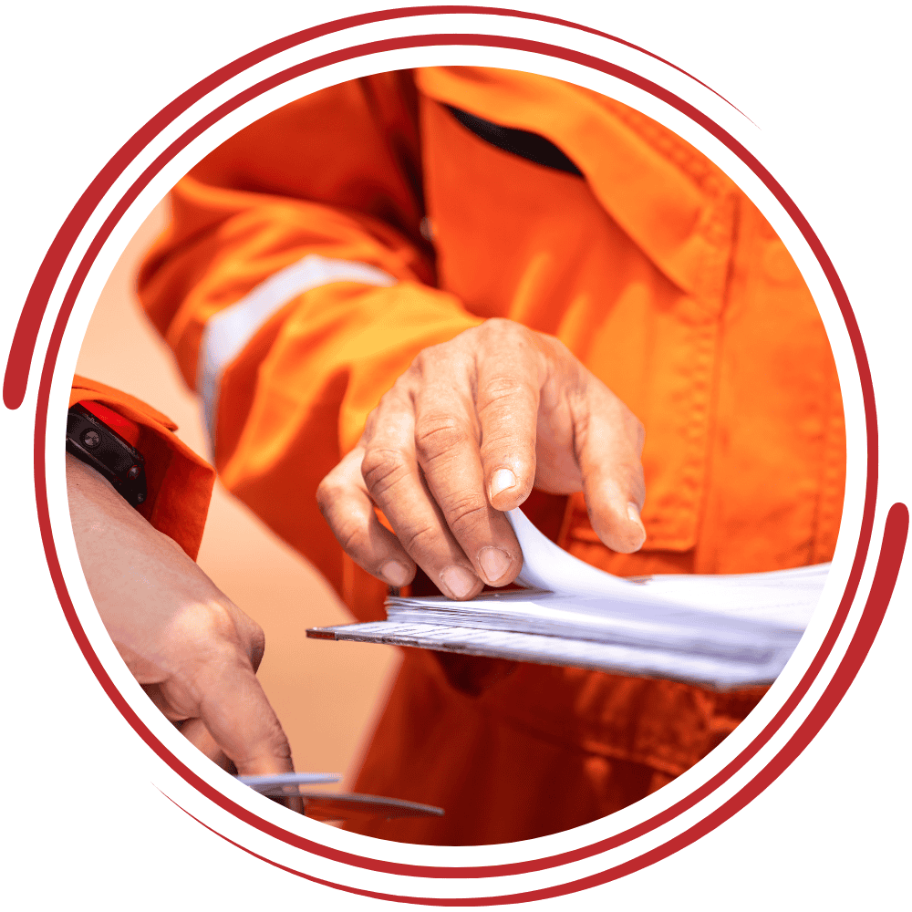 Worker conducting ISO 45001 safety audit with documents and checklist.